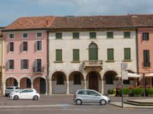 Pastel coloured buildings in the main piazza