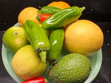 Limes lemons oranges avocados and peppers
