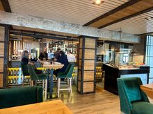 The bar area at ANTONIO, where I sit at a high-topped small table facing the bar