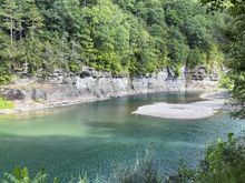 The Schoharie Creek running along the edge of the campground. Disastrous 
flooding in the area from Irene in August 2011.