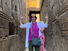 Arms raised in imitation of the Ka sign. The Ka is the life force or spiritual double of a person and is represented with 2 arms raised. 