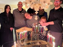 Festival of light! Standing by the table one can feel the heat of the candles. . 