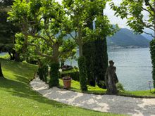 The villa's promenade along the lake