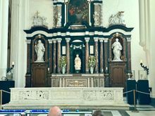 Inside the church stands the Madonna of Bruges crafted by Michelangelo in 1504. It was brought to Bruges by a wealthy Flemish businessman, but has had a most interesting history, having been stolen by the French revolutionaries in 1794 during the Napoleonic wars and then by retreating Nazis in 1944 during World War II, which was the subject of the movie The Monuments Men. Can you guess which one it is?