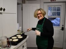 Pancakes cooked on a griddle because stove was busy with eggs and home fries 