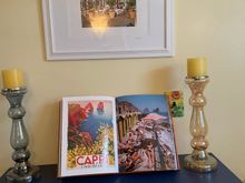 I ordered a cookbook holder for the book. It’s gold looks like a birdcage with weighted chains to hold the pages 