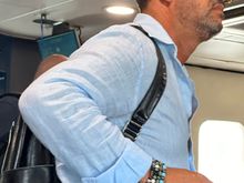 Dapper fellow tourist on boat....check out the Fedora, the glasses, the bracelets.......we KNOW that this guy is NOT an American and we can bet we know from what country he hails.....  My partner, meanwhile, wears a Yankee hat and I am in bike shorts and a t-shirt from Land's End.
