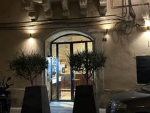 Entrance to Don Camillo, considered the finest restaurant in Ortigia.(Siracusa).   We arrived via the hotel shuttle, which left us at the bridge connecting Ortigia with Siracusa.