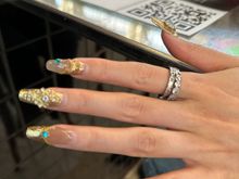 Look at the nails of my very young dining companion at BAR CENTRAL in Valencia's MERCAT CENTRAL; she is traveling solo through Spain and hails from Wuhan....more adorable I've not seen often!