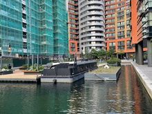 Behind the Paddington Station and St. Mary's Hospital is the Paddington Basin, once and still a canal, but now they are building really upscale building and apartments along the canal.