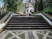 The lower staircases are tiled and slope gradually up, with small chapels along the way.