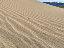 Ripples of sand along sand dunes at Mesquite Flat