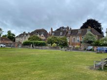 This is the Close, a large amount of land around the Cathedral. Eventually a wall was built around the Close because the Abbot got a little worried about the general populace. A lot of the rich people built houses inside the Close.