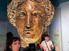 In Roman times this was a huge complex with a temple.  Inside the temple would have been a statue of Sulis Minerva.  Head of Minerva, body has been lost.