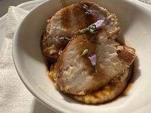 Slices of swordfish layered over a puree of chickpeas (ceci) 