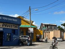 Typical scene near the docks; not many cars, many people walking or on bikes.  I stopped into a local supermarket but could not find anyone selling fresh fruit....