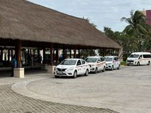 Taxis waiting at the cruise port, Puerta Maya.  The guys who rent their taxis seem to stick to the official rates, which are posted here and at the beaches...I walked away from this area and got a taxi on the street...