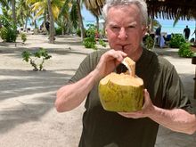 Me enjoying a Piña Colada from a hallowed out coconut 