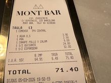 My bill from my first meal in Barcelona.  
I later mourned the fact that I did not order the suckling pig Cantonesa.  My obsession with trying this dish would prove to be a very costly mistake a few days later.

Dinner, with water and three half orders plus two comped courses was 73 euro.   Very reasonable for one of the city’s best eateries recently awarded its second Michelin star.    

Tiny dining room reminiscent of a Parisian “gastro bistro” with no pretensions, no tablecloths.      