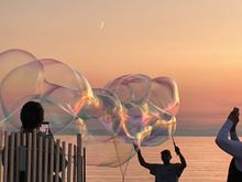 The Bubble Guy. The last two nights, there has been a guy down on the beach making these fantastic bubbles.  There are really amazing, each set different.