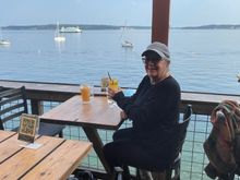 The happy girl on her birthday, shore side.