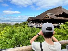 My son checking out the crowds behind us