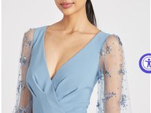 Doesn’t this lady look awfully young to be a MOB? Lol. The models on all these dresses are my daughters’ age!! But they are marketed to MOBs. 

