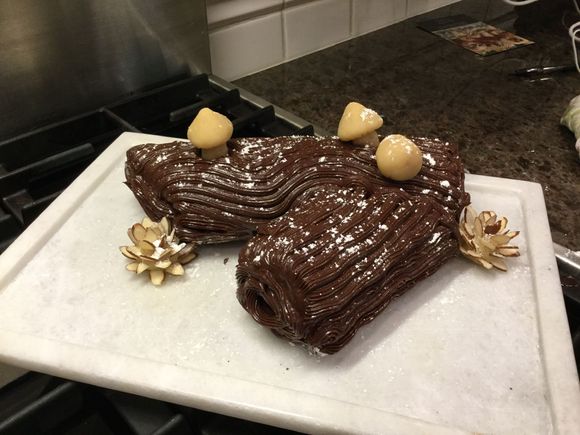 
The mushrooms are marzipan and the pine cones are also marzipan and sliced almonds. 