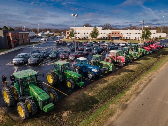 I didn’t take this picture but this is a view of Tractor Day in my town last Friday. Does this photo not scream  Midwest  Farm Town??  Obviously school is in session here, that’s the high school. 