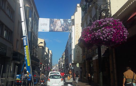 Flower decoration and big posters were hanging on streets everywhere, as the Cannes Film festival had just ended