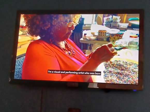 Artist's joke was that she was born a fantastic artist, and she came out and said to the doctor, "move, you're in my light"