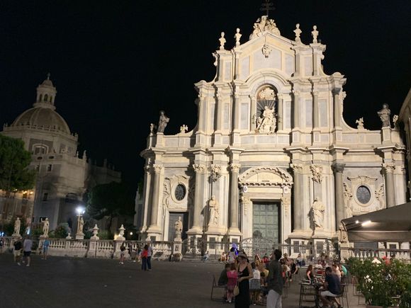 St. Agatha stands guard over her city from the top of the Duomo on a steamy night in the gritty but delightful city of Catania.