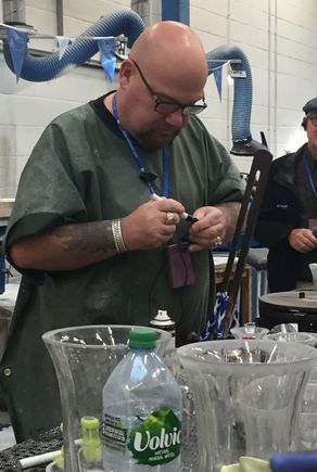This is Sean, owner of Dingle Crystal and the head glass cutter. He parks his Harley inside the building. a very large Harley. I imagine he is the nephew that guy was talking about. We toured the factory, hence my purchases.