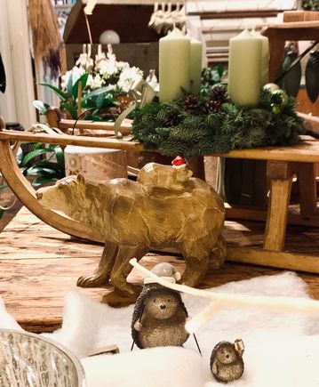 We bought the carved wooden bear for part of our decorations this year