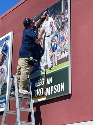 Sloan Field, winter training for my beloved Chicago Cubs. (Baseball). I couldn’t look very long at this guy on the ladder, first because he was on a ladder and second because he was covering up Anthony Rizzo (my forever favorite player) as he was traded to the Yankees. 