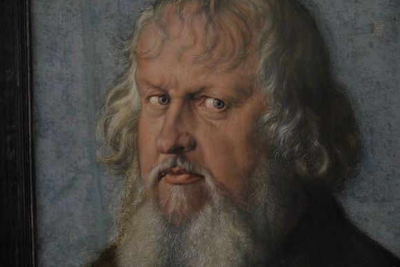 The artist painted the windows reflection in his eye. Incredible detail.