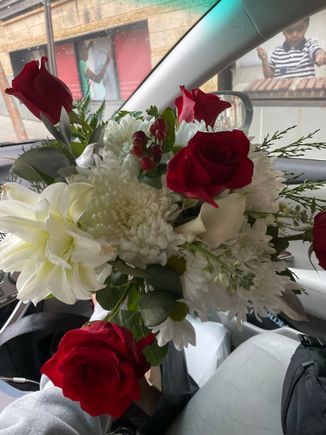 I had her trim the roses down. I tried to pass off my milk chocolate Godiva for her but it turns out this mother likes dark chocolate. Which is in her favor by my standards, lol. 