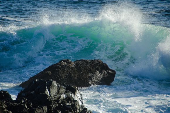 Wave action pummels the island's coast.