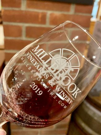 Tasting one of the Pinot Noirs.