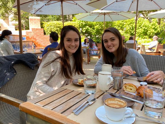Two silly young women at brunch. 