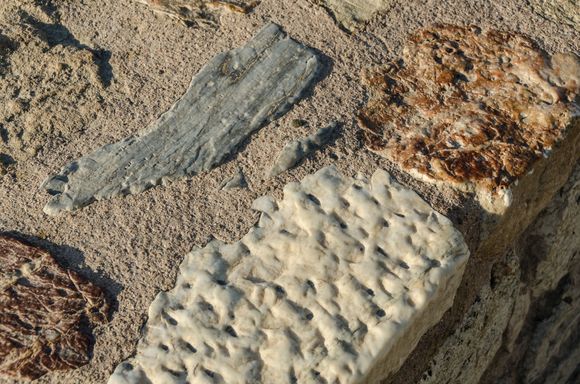 The local stonework reveals different materials, and maybe different epochs.