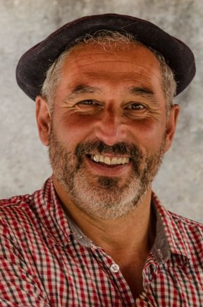 A vendor from another part of France. He had a booth at Quimper's weekly market.