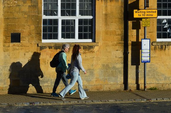 The golden hour in a gold stone town. Stone tones in the Cotswolds are warmer in the north. Buildings with the honey-coloured stone became so admired in the once-and-again affluent Cotswolds, that London's St. Paul's Cathedral was built from  local quarries.
*this shot was taken through a window. 