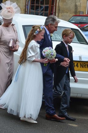 The couple and their families must've been well-off, as parked out front beside the Grey Ghost there were a Lamborghini, a Ferrari and a Maclaren. All three gift-wrapped.