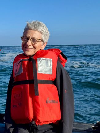 On the tender to climb a ladder to enter the Anacapra Island National Park 