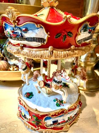  Model carousels seem to be in vogue this year. I see them all over in holiday displays. 