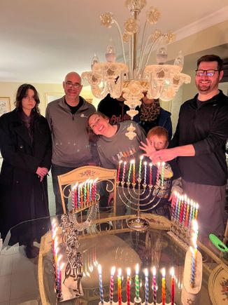 Festival of light! Standing by the table one can feel the heat of the candles. . 