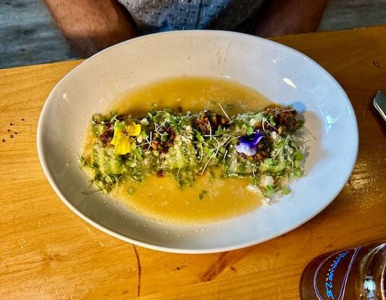 Raviolis stuffed with a bolognese and pine nuts