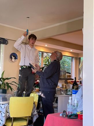 Grandson Harry and Grandad in fix it mode