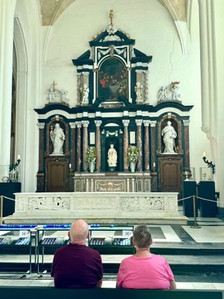 Inside the church stands the Madonna of Bruges crafted by Michelangelo in 1504. It was brought to Bruges by a wealthy Flemish businessman, but has had a most interesting history, having been stolen by the French revolutionaries in 1794 during the Napoleonic wars and then by retreating Nazis in 1944 during World War II, which was the subject of the movie The Monuments Men. Can you guess which one it is?